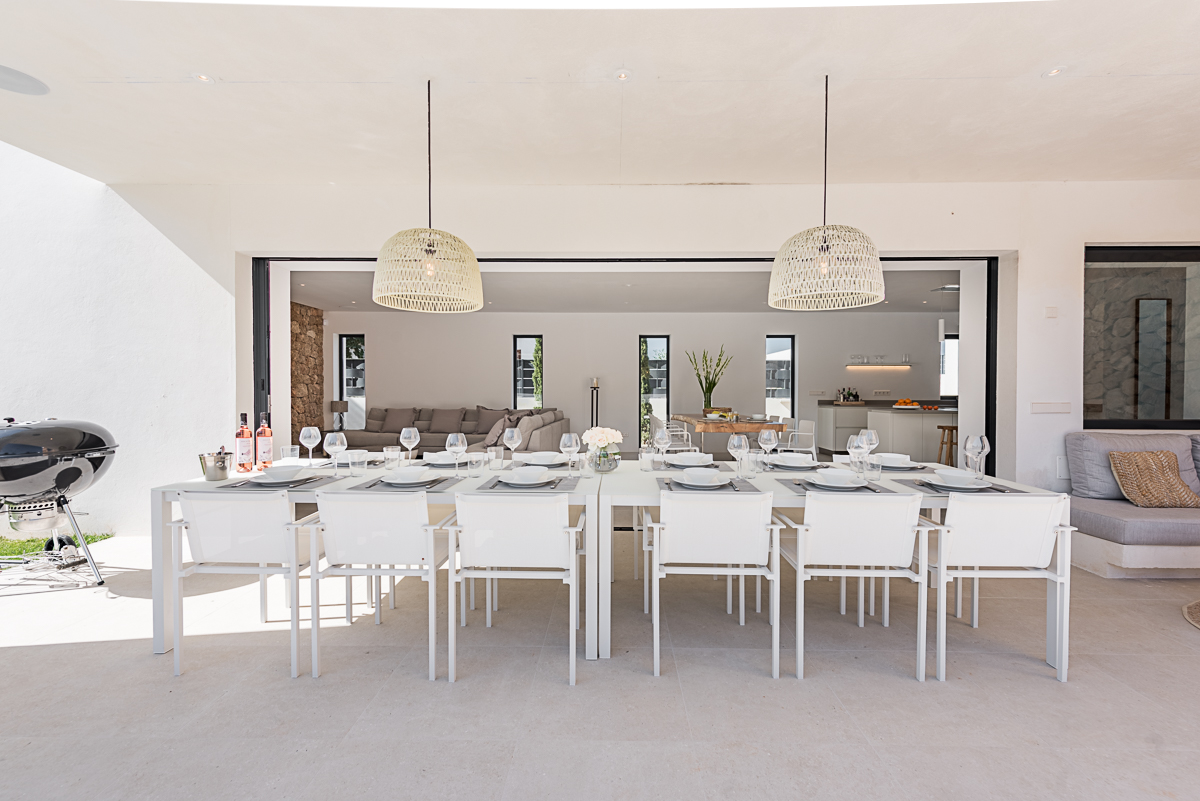 Resa estate modern villa for sale ibiza first line north outdoor dining.jpg